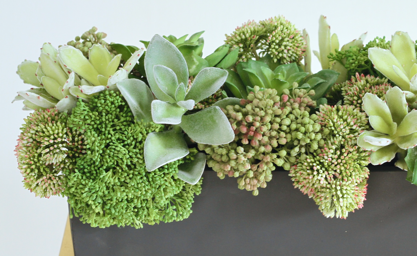 Artificial succulents in online pots