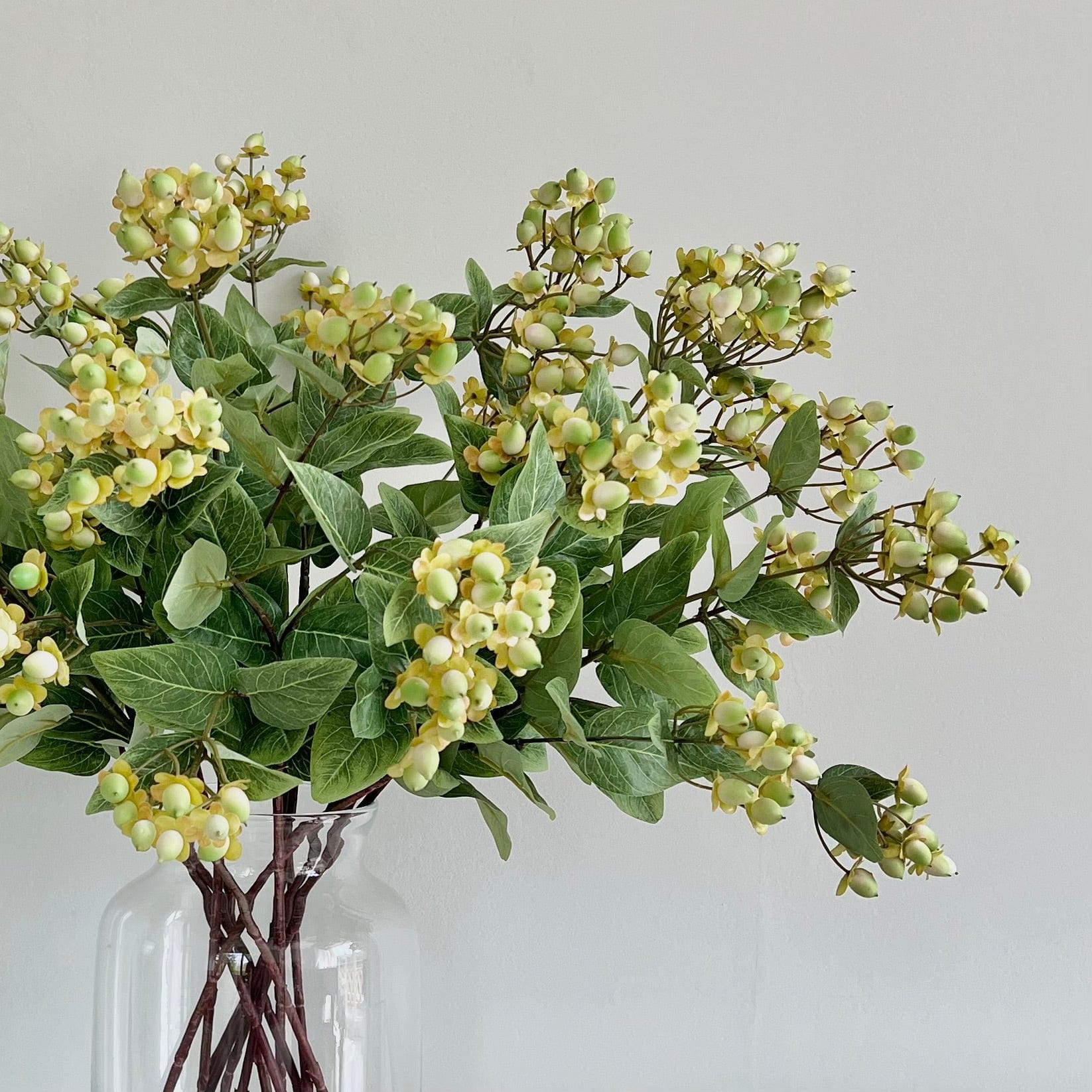 Artificial flowers luxury lifelike faux Artificial Green Hypericum Berries realistic silk single stems buy online from The Faux Flower Company