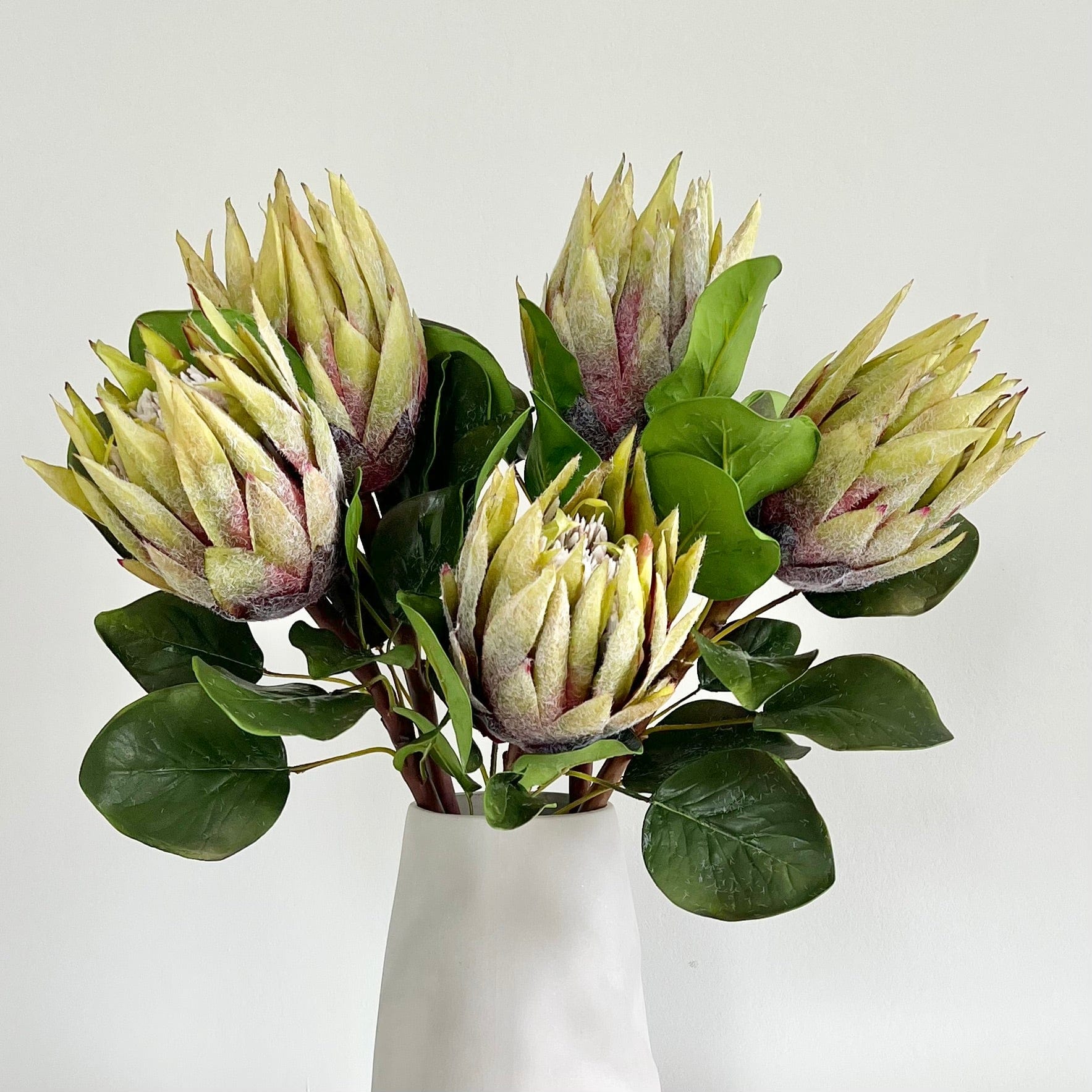 Artificial flowers luxury lifelike faux Artificial Green King Protea realistic silk single stems buy online from The Faux Flower Company