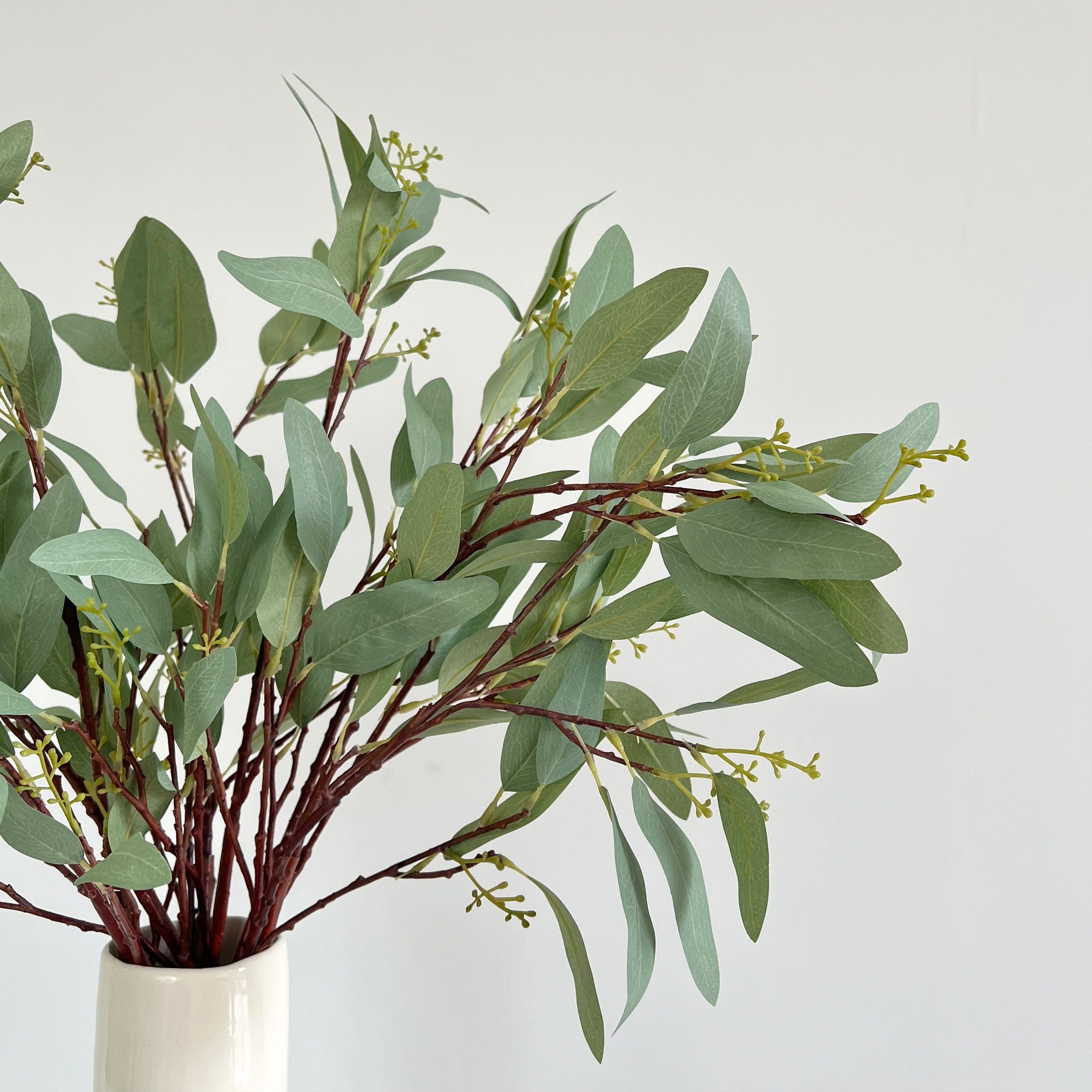 Artificial flowers luxury lifelike faux Artificial Green Willow Eucalyptus realistic silk single stems buy online from The Faux Flower Company