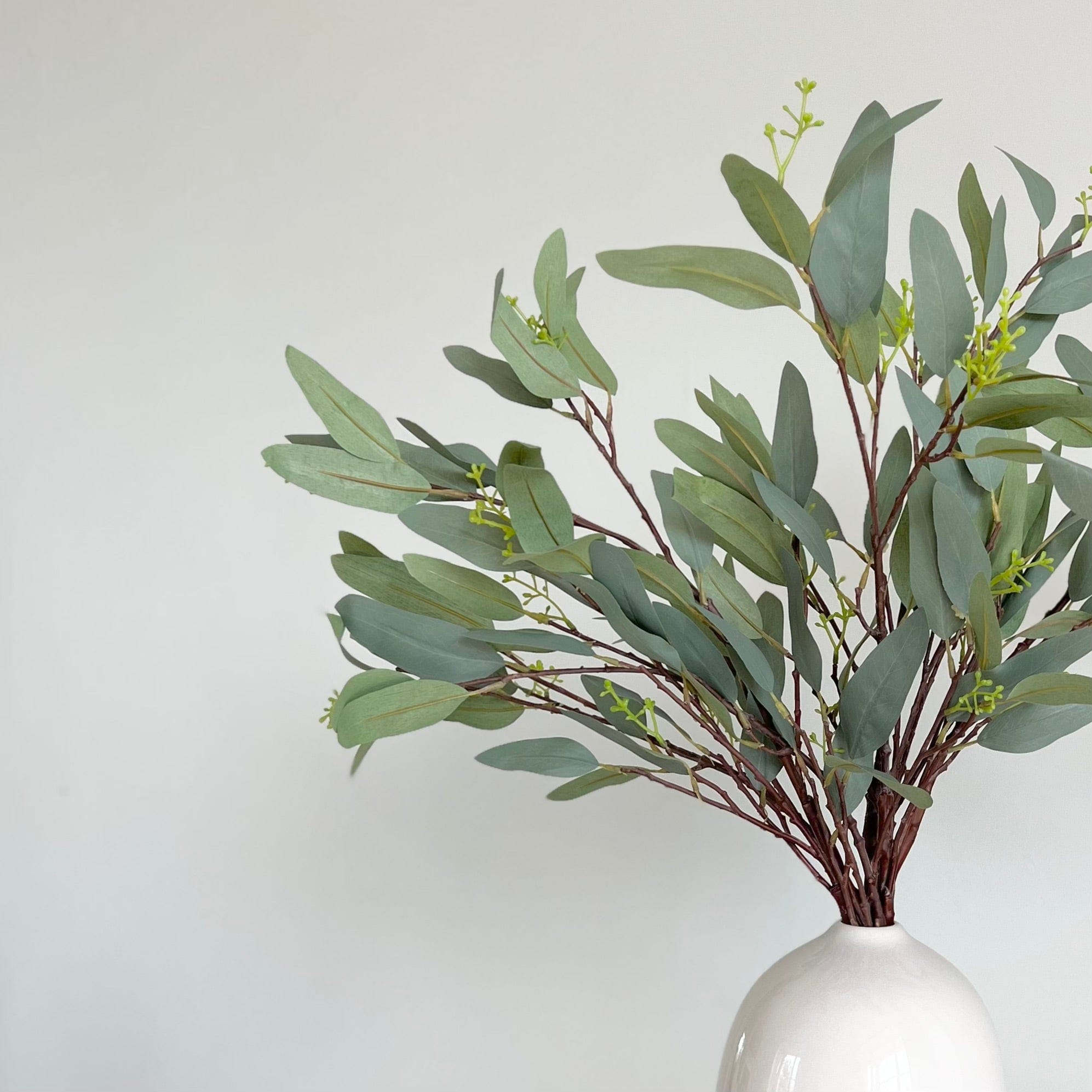 Artificial flowers luxury lifelike faux Artificial Green Willow Eucalyptus realistic silk single stems buy online from The Faux Flower Company