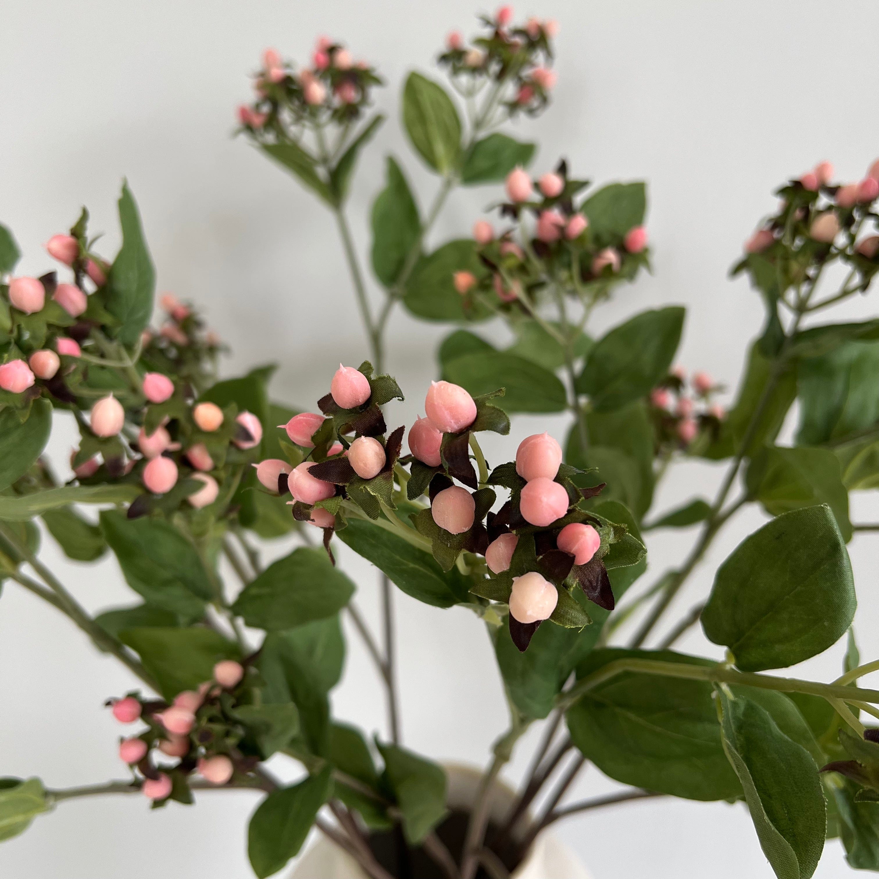 Artificial flowers luxury lifelike faux Artificial Pink Hypericum Berry realistic silk single stems buy online from The Faux Flower Company