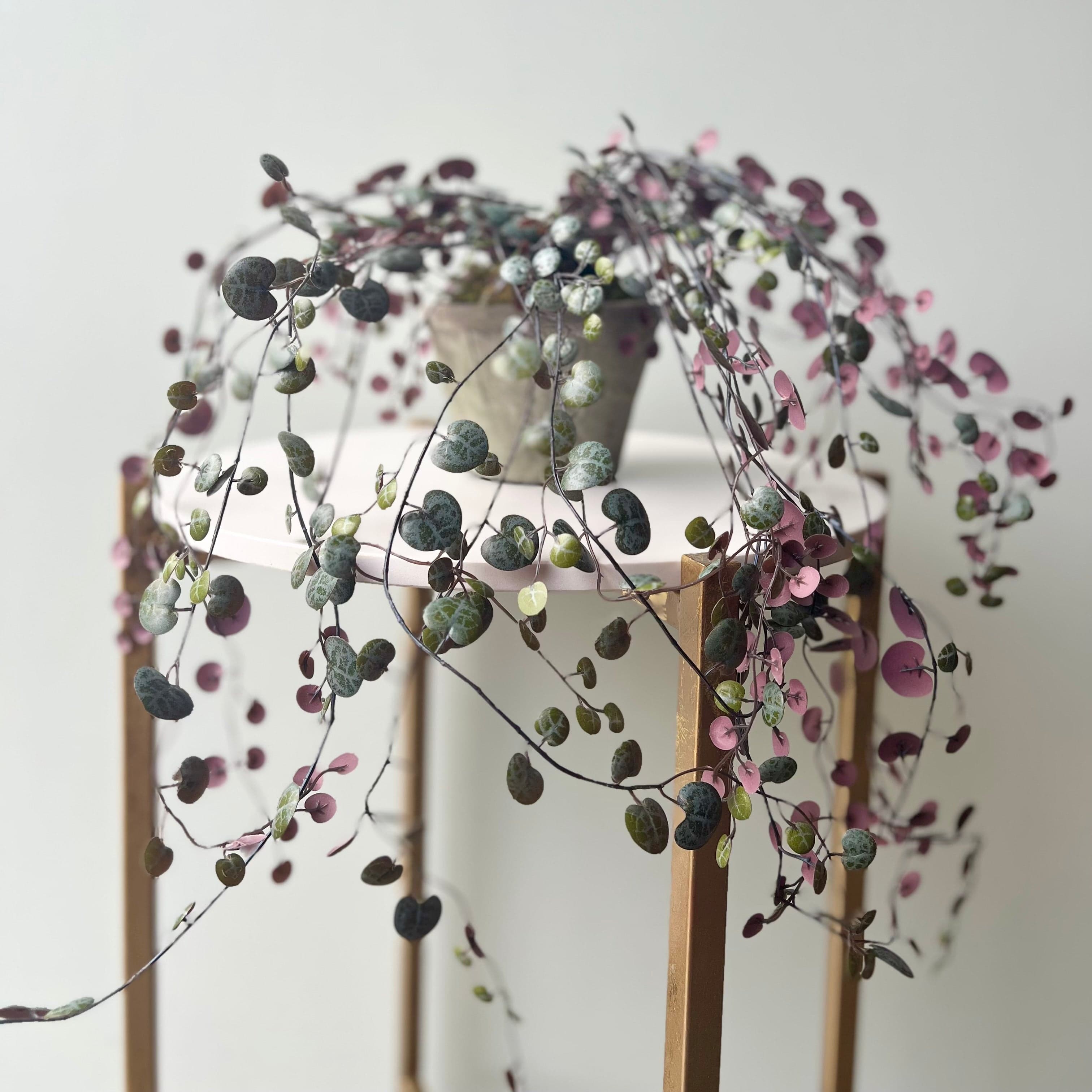 Artificial flowers luxury lifelike faux Artificial Purple Hanging Angel Vine Plant with Grey Cement Pot realistic silk Plants buy online from The Faux Flower Company AHCH-0781
