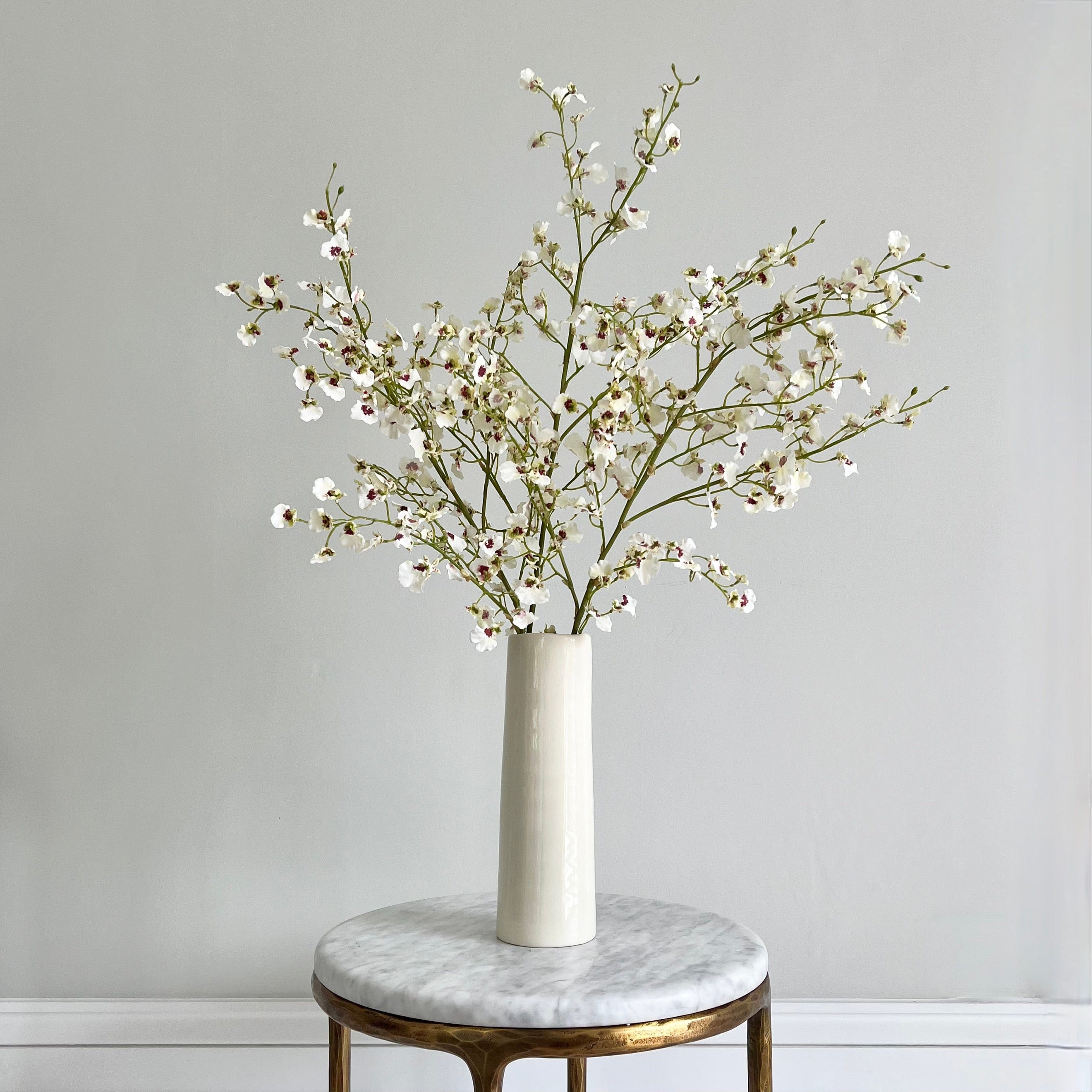 Artificial flowers luxury lifelike faux Artificial White Oncidium Orchid realistic silk single stems buy online from The Faux Flower Company