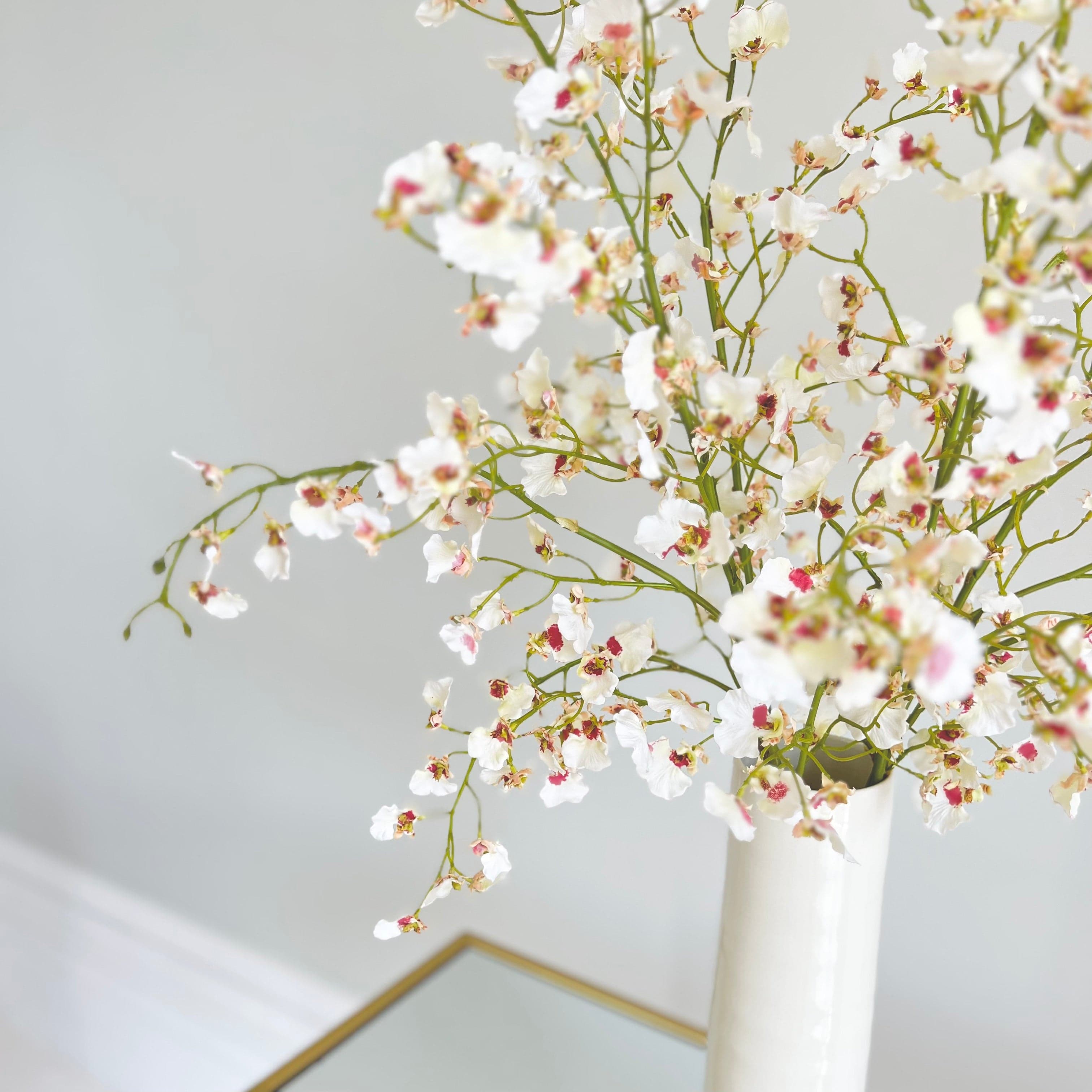Artificial flowers luxury lifelike faux Artificial White Oncidium Orchid realistic silk single stems buy online from The Faux Flower Company