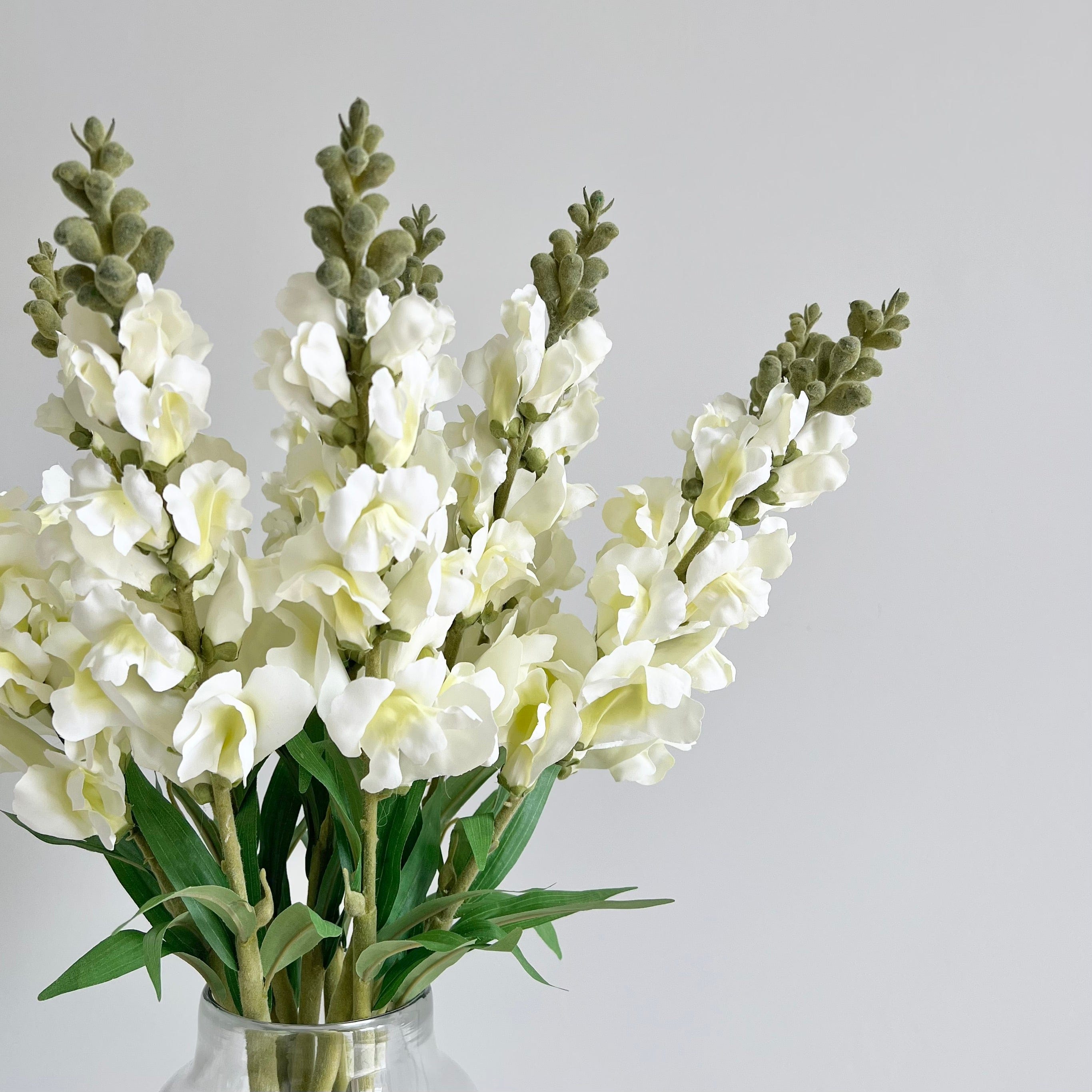 Artificial flowers luxury lifelike faux Artificial White Snapdragon realistic silk single stems buy online from The Faux Flower Company