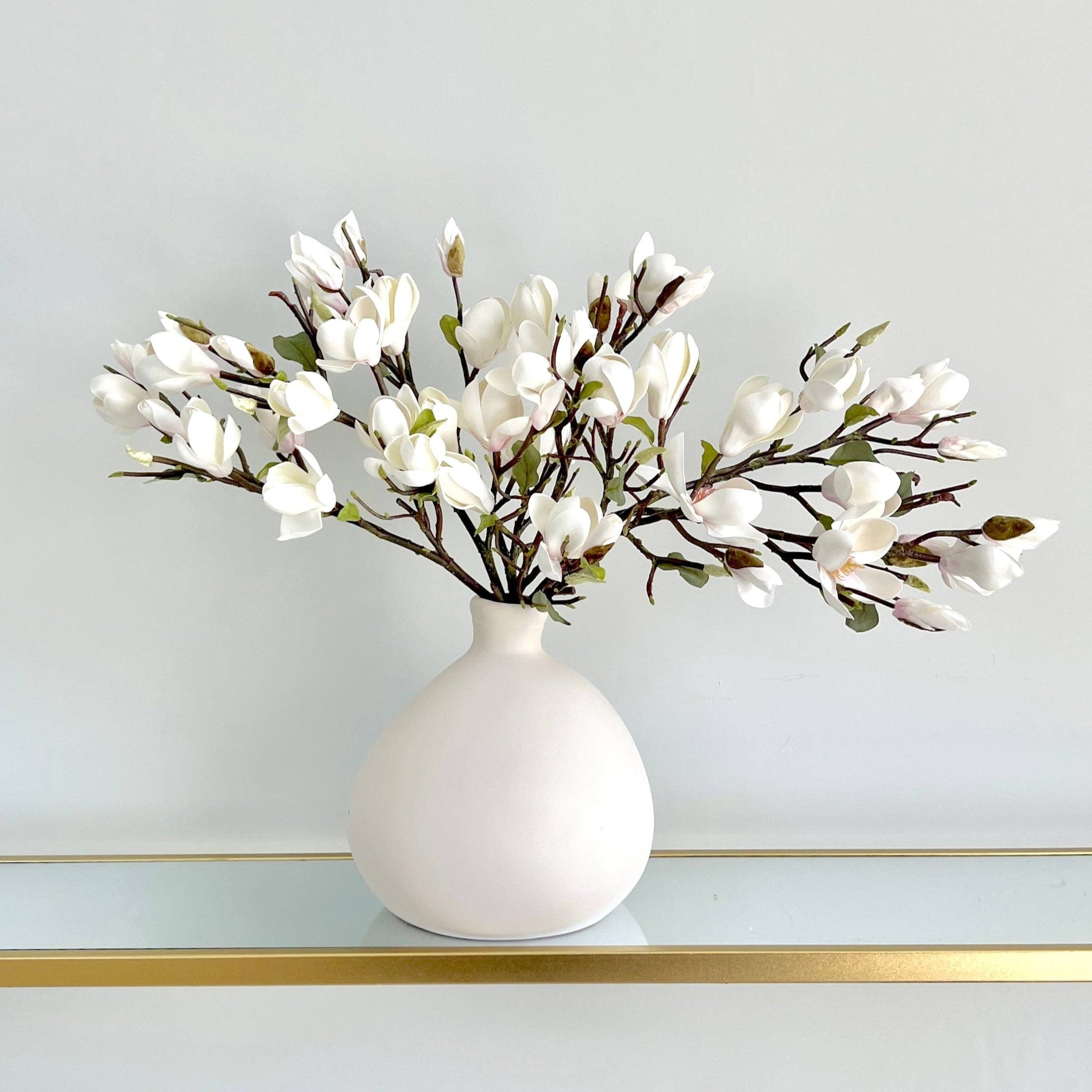 Artificial flowers luxury lifelike faux Artificial White Tall Magnolia realistic silk single stems buy online from The Faux Flower Company