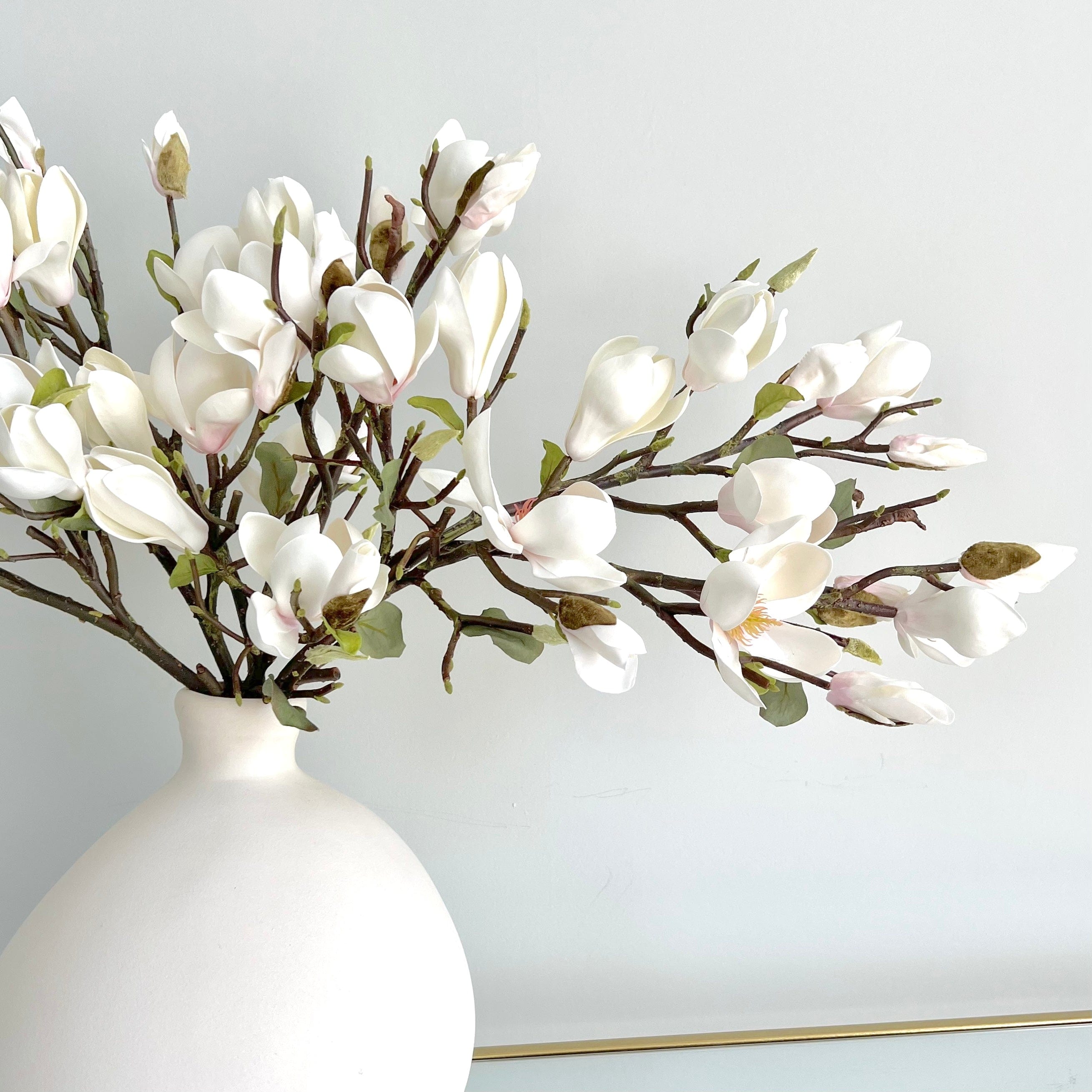 Artificial flowers luxury lifelike faux Artificial White Tall Magnolia realistic silk single stems buy online from The Faux Flower Company