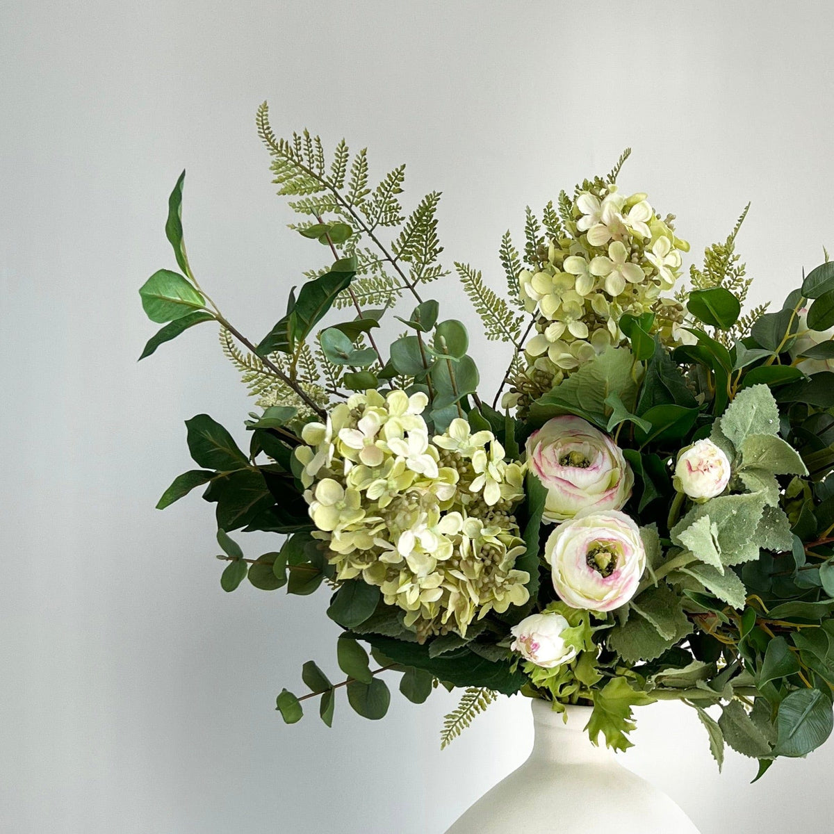 Realistic Green Light Artificial Flower Arrangement by The Faux Flower Company
