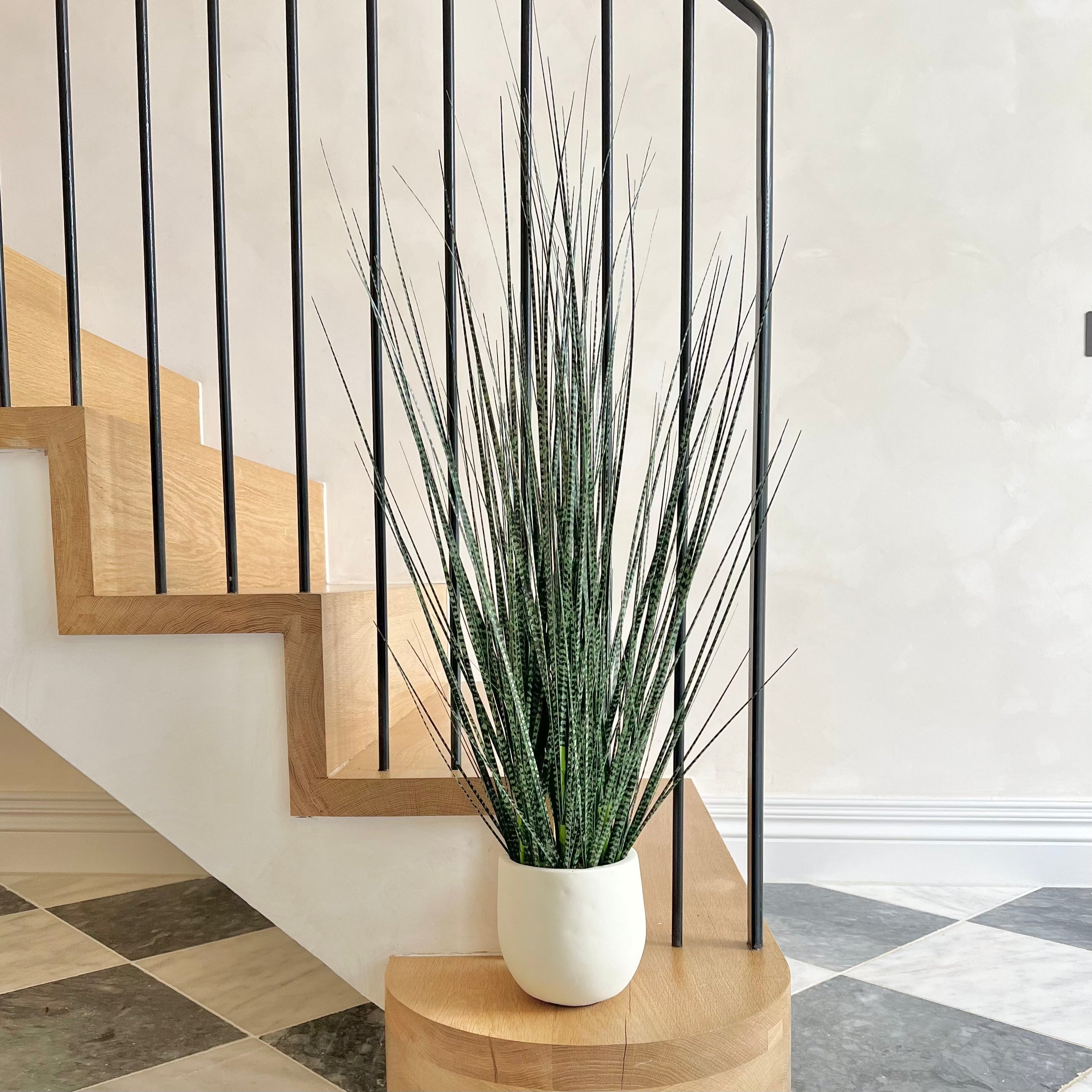 Artificial flowers luxury lifelike faux Mottled Onion Grass in Stone-look Planter realistic silk Plants buy online from The Faux Flower Company AHCH-1523