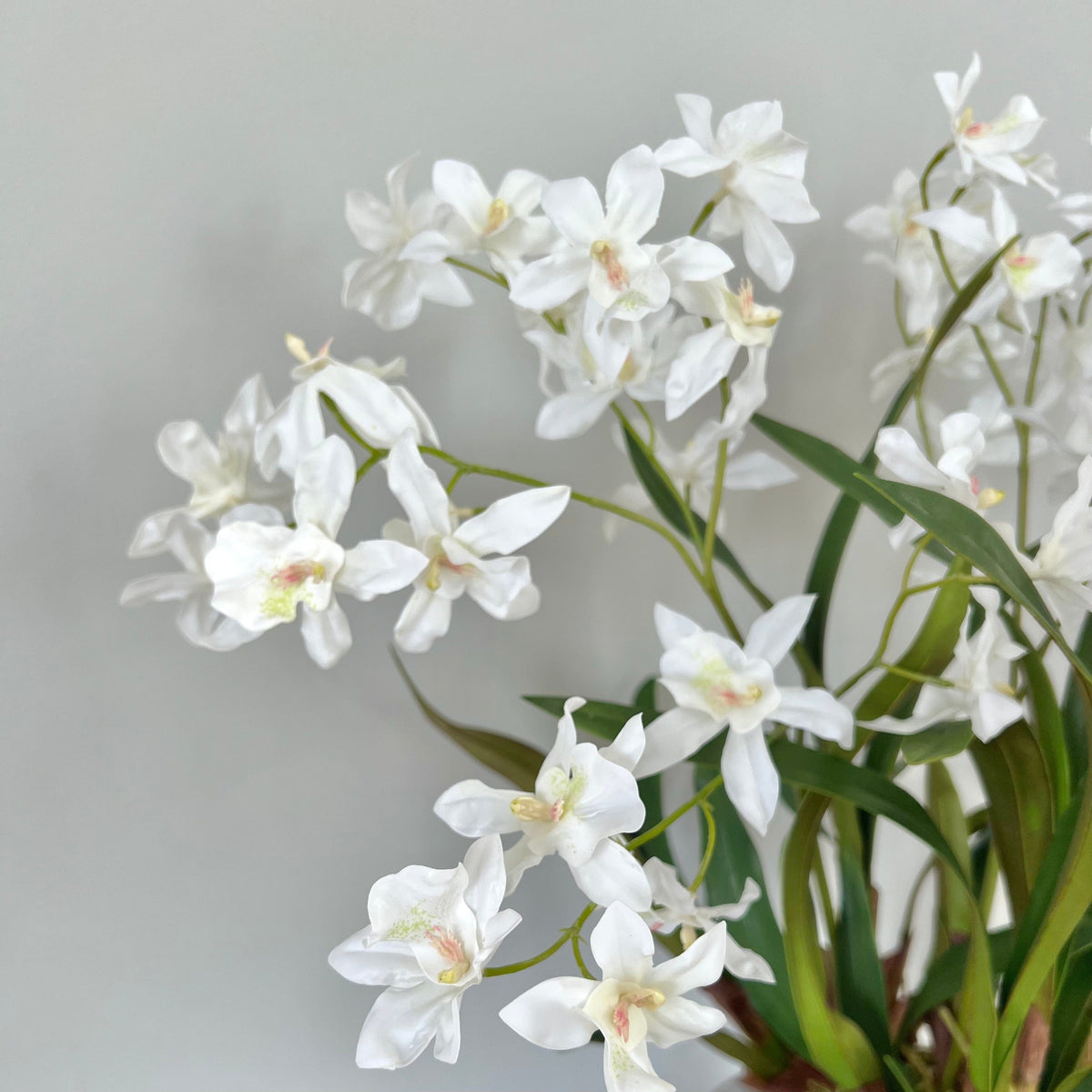Realistic White Artificial Dendrobium Orchid Plant ABY2062WH by The Faux Flower Company