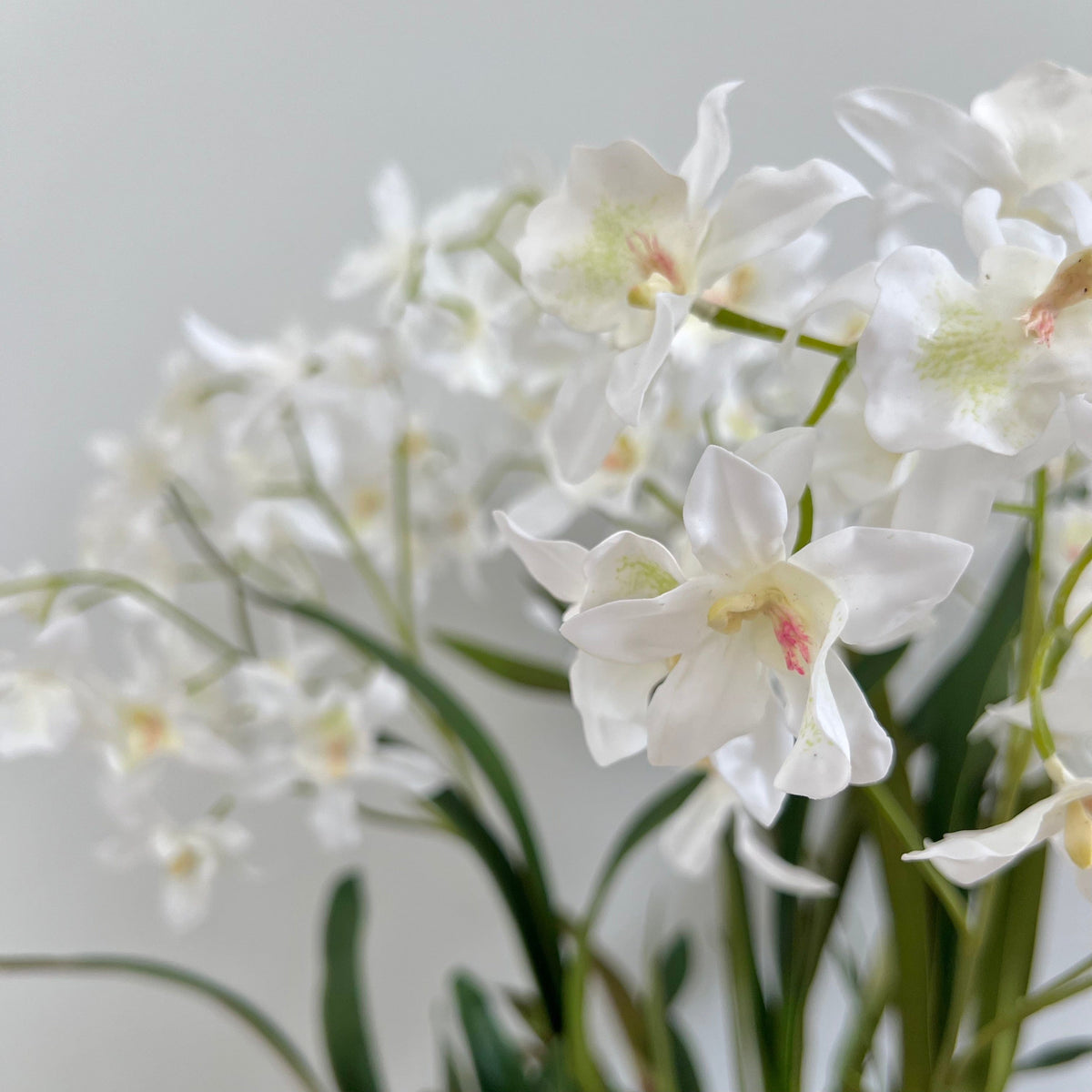 Realistic White Artificial Dendrobium Orchid Plant ABY2062WH by The Faux Flower Company