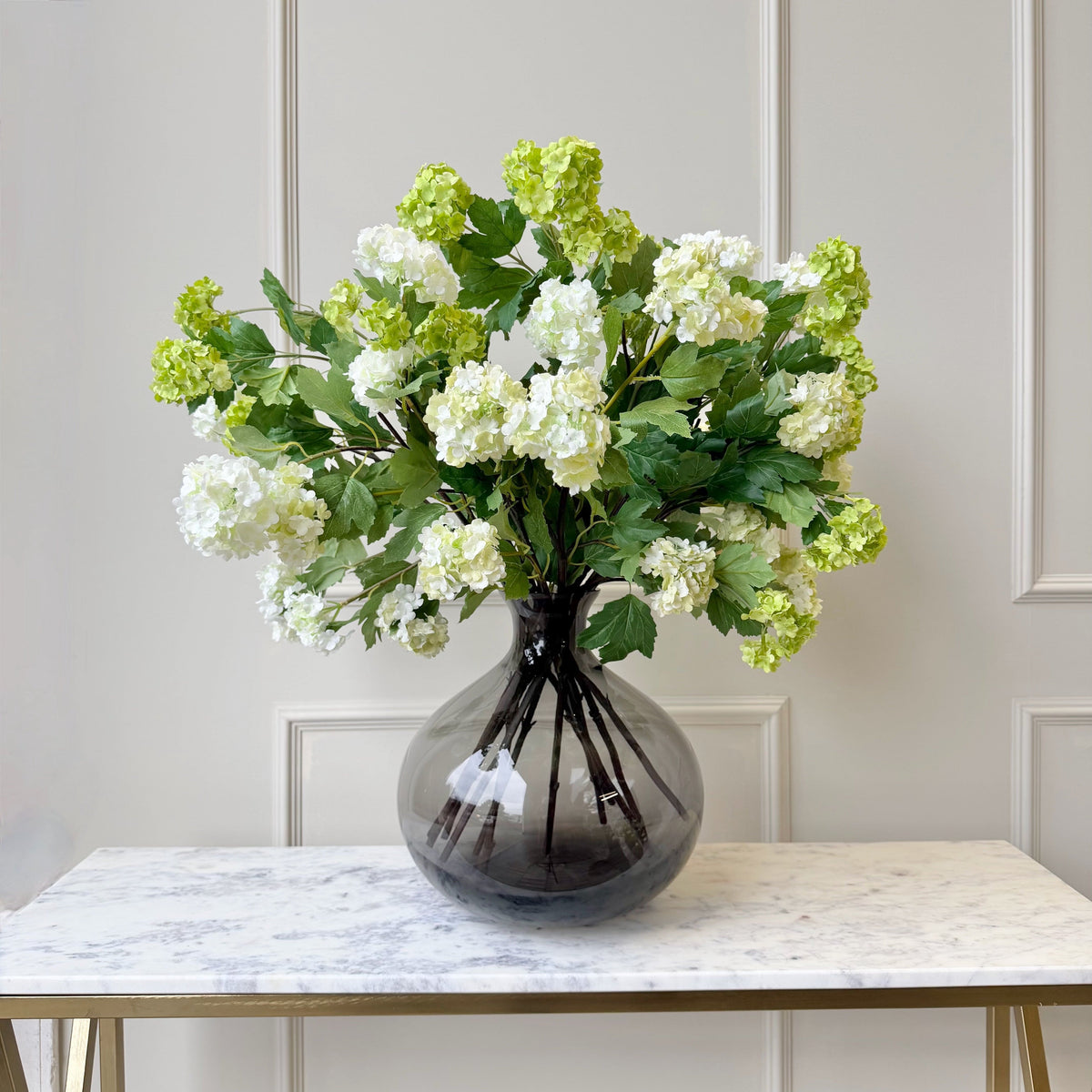 Realistic Artificial Spring Greens Flower Arrangement by The Faux Flower Company