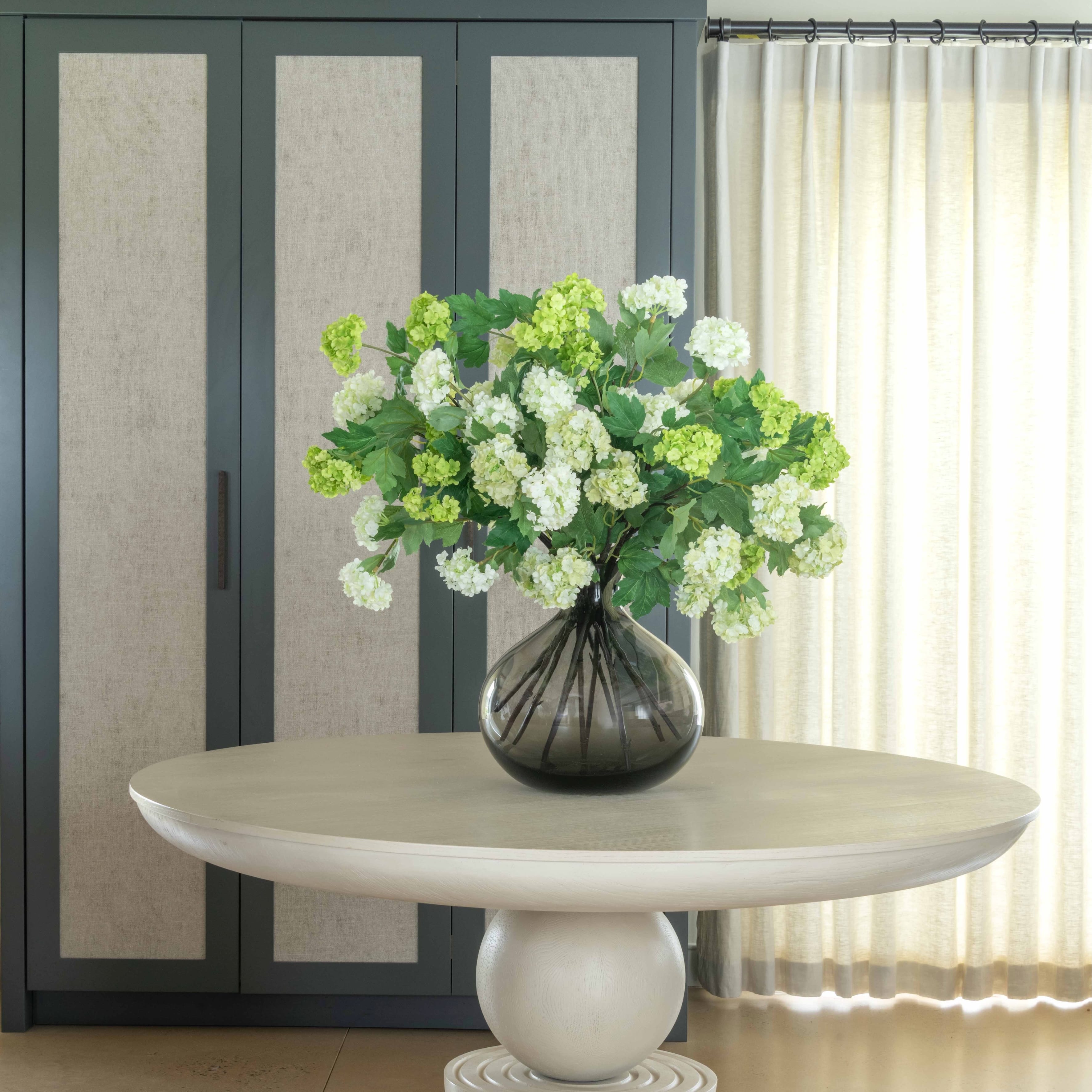 Realistic Spring Greens Artificial Flower Arrangement by The Faux Flower Company
