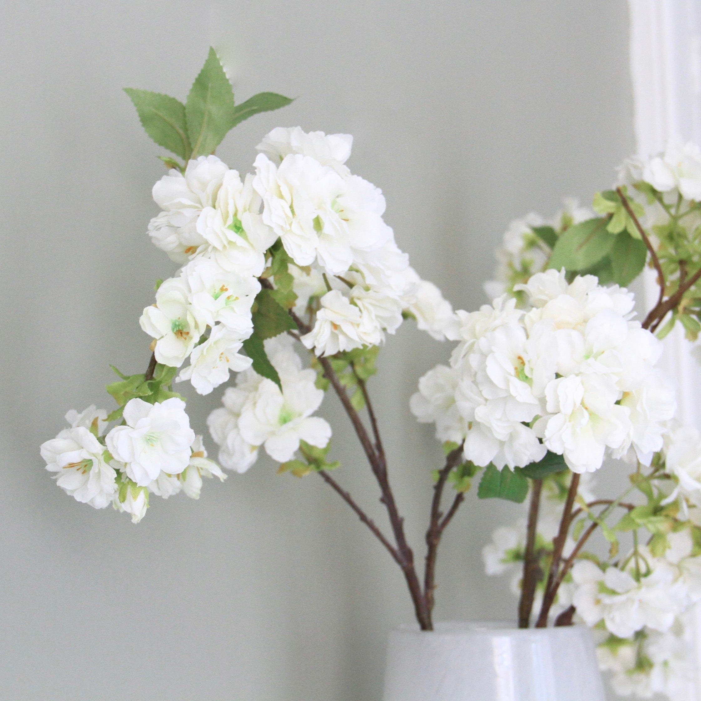 Artificial flowers luxury lifelike faux Artificial White Cherry Blossom realistic silk single stems buy online from The Faux Flower Company