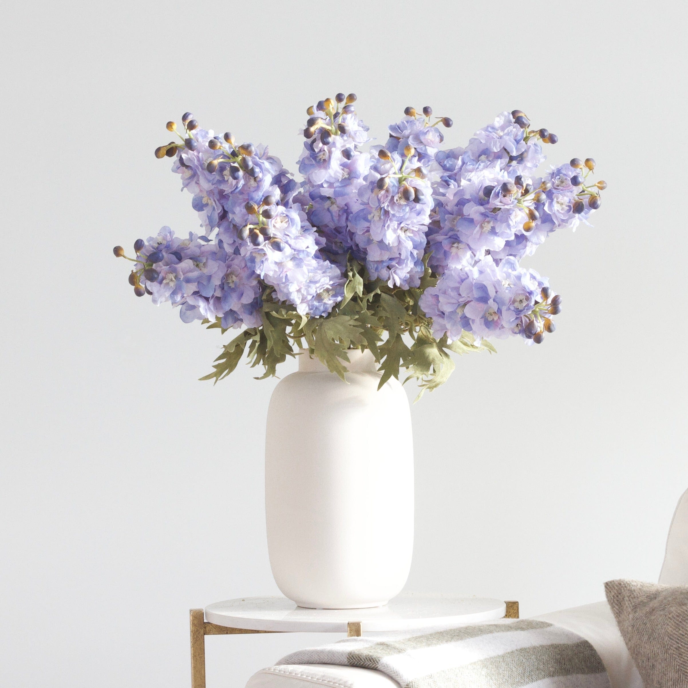 Luxury Lifelike Realistic Artificial Fabric Silk Blooms with Foliage Buy Online from The Faux Flower Company | 12 stems of Blue Delphinium ABX2339BL styled in Kingham Vase ABP04B3