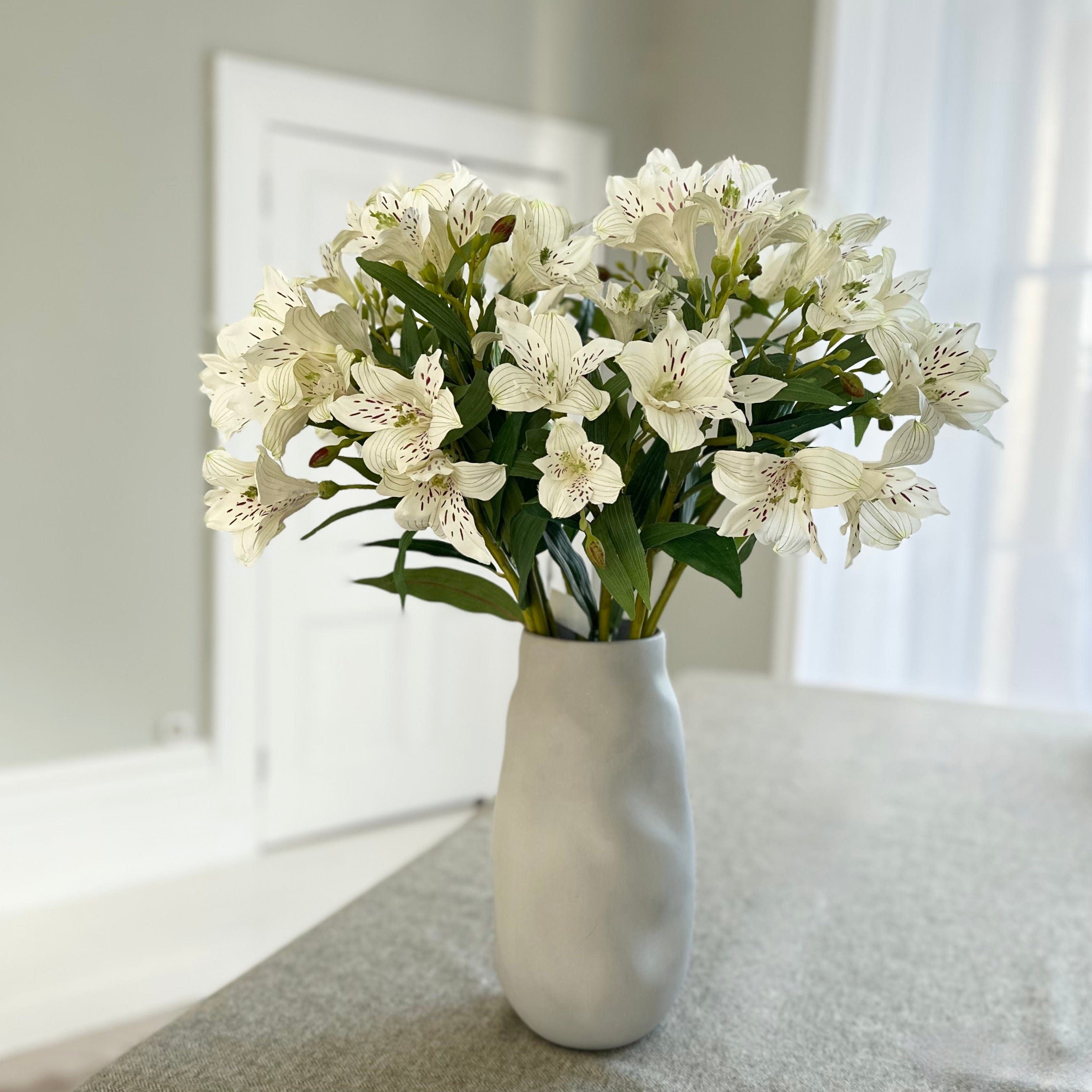 Luxury Lifelike Realistic Artificial Fabric Faux Silk Luxury White Small Lily ABX8543WH Artificial Flower Arrangement with Faux Foliage Buy Online from The Faux Flower Company