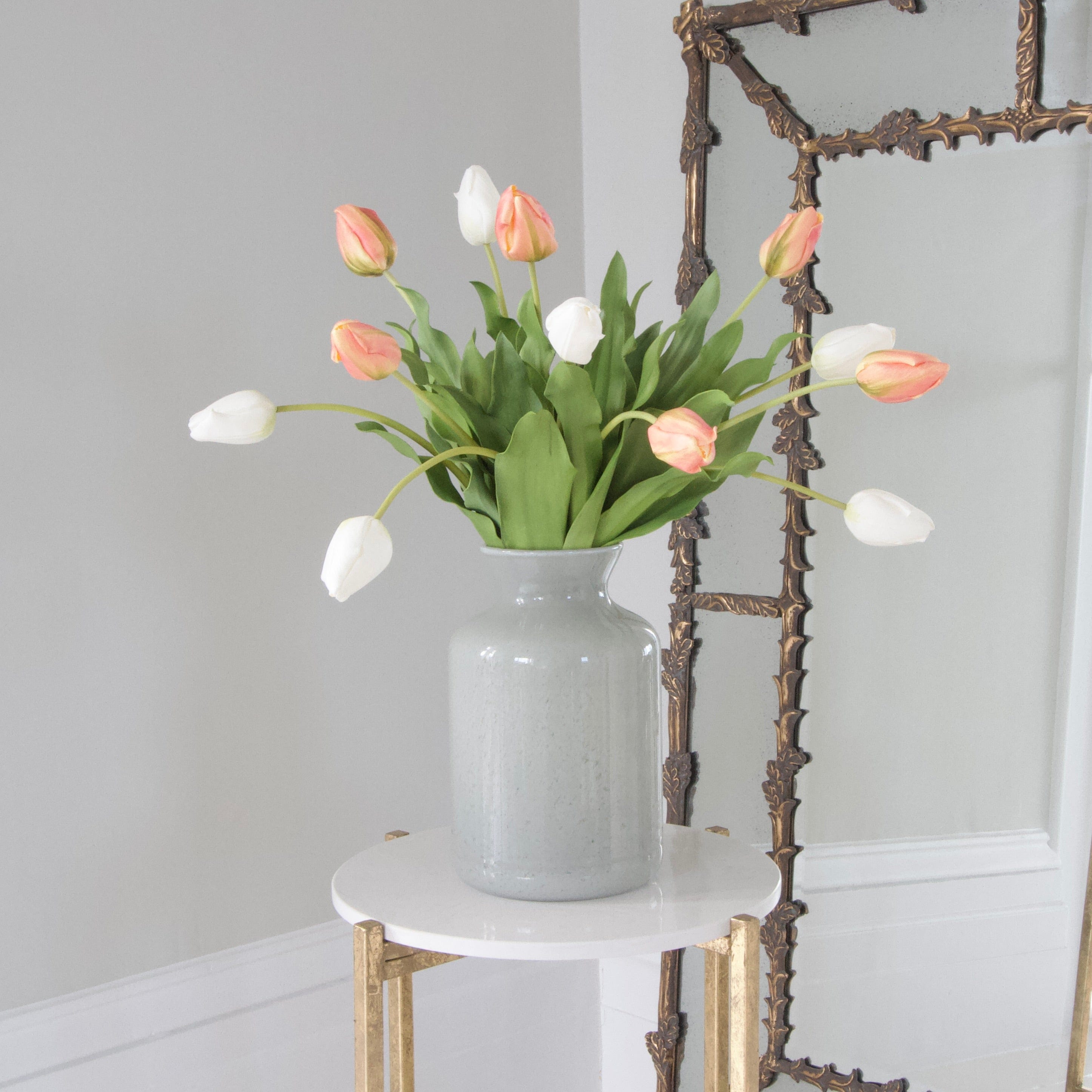 Luxury Lifelike Realistic Artificial Fabric Silk Blooms with Foliage Buy Online from The Faux Flower Company | 12 stems Tulip Bouquet styled in Glass Funnel Neck Vase