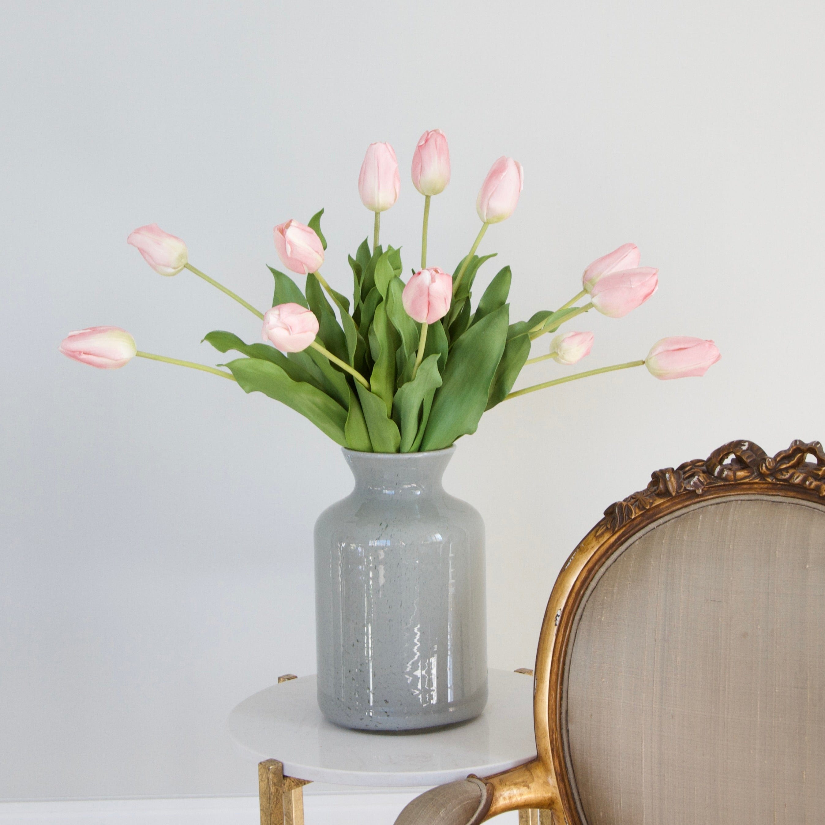 Luxury Lifelike Realistic Artificial Fabric Silk Blooms with Foliage Buy Online from The Faux Flower Company | 12 stems Pink Tulip ABY5657PK styled in Large Grey Funnel Neck Vase ABV0144