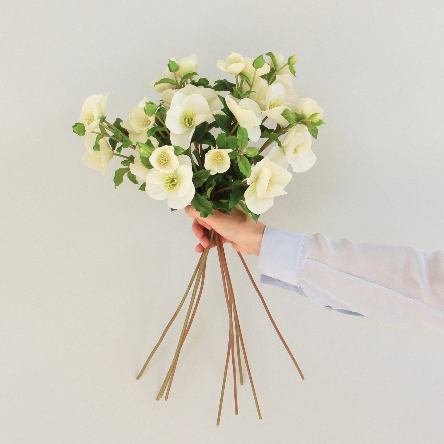 Artificial hellebore the finest white faux hellebore and also known as the artificial Christmas rose, luxury silk flowers realistic faux flowers from Amaranthine Blooms UK