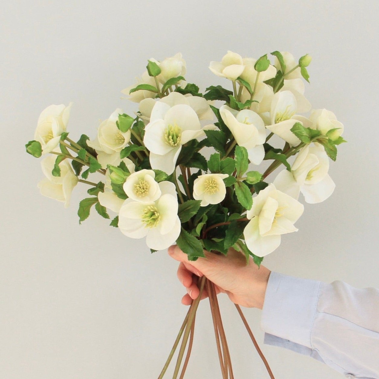 Artificial hellebore the finest white faux hellebore and also known as the artificial Christmas rose, luxury silk flowers realistic faux flowers from Amaranthine Blooms UK